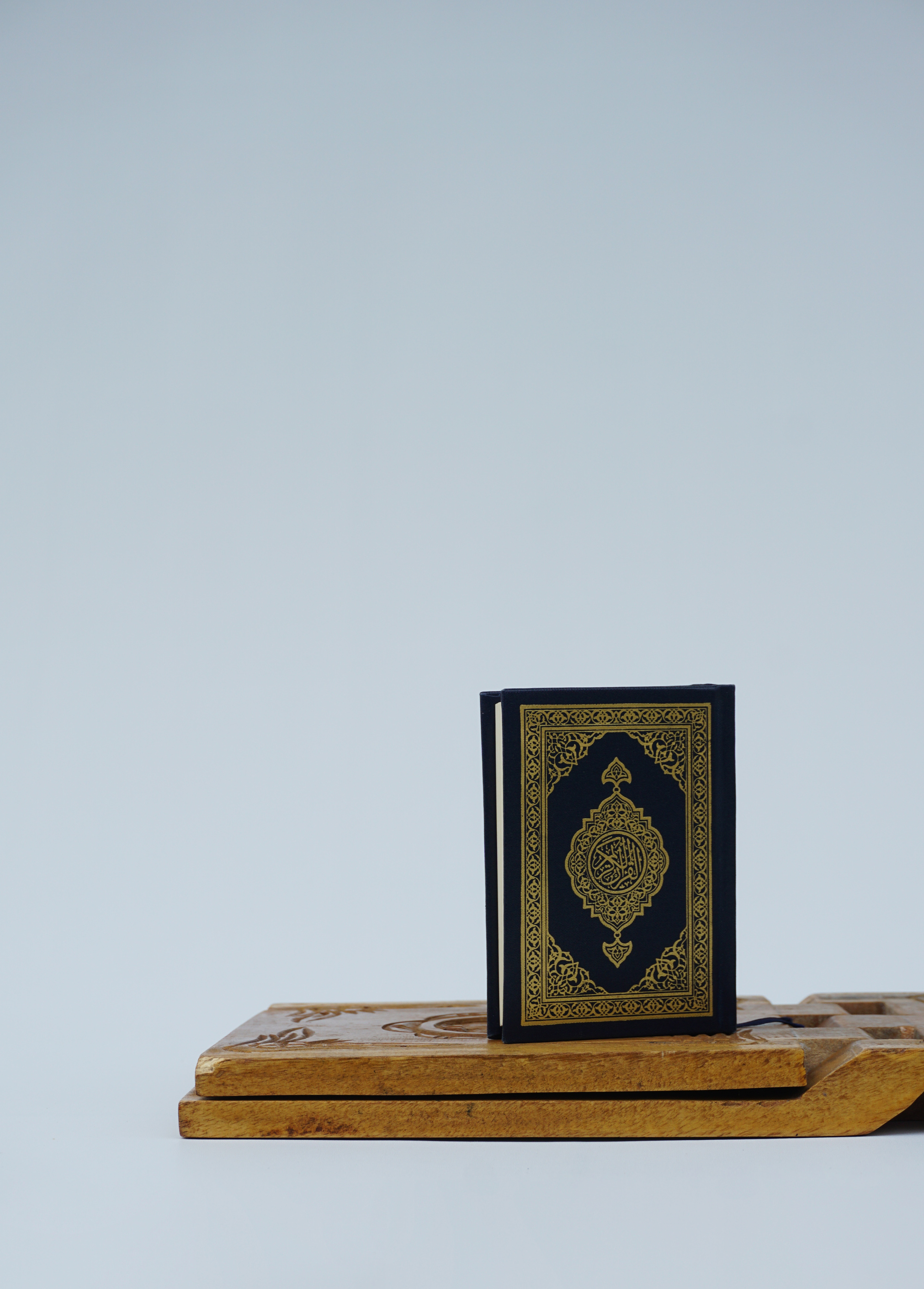 Quran on Wooden Top Board